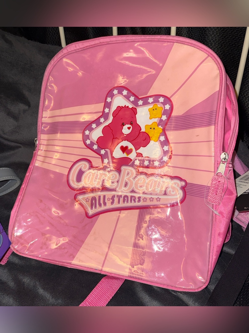 Care Bears pink backpack flaws